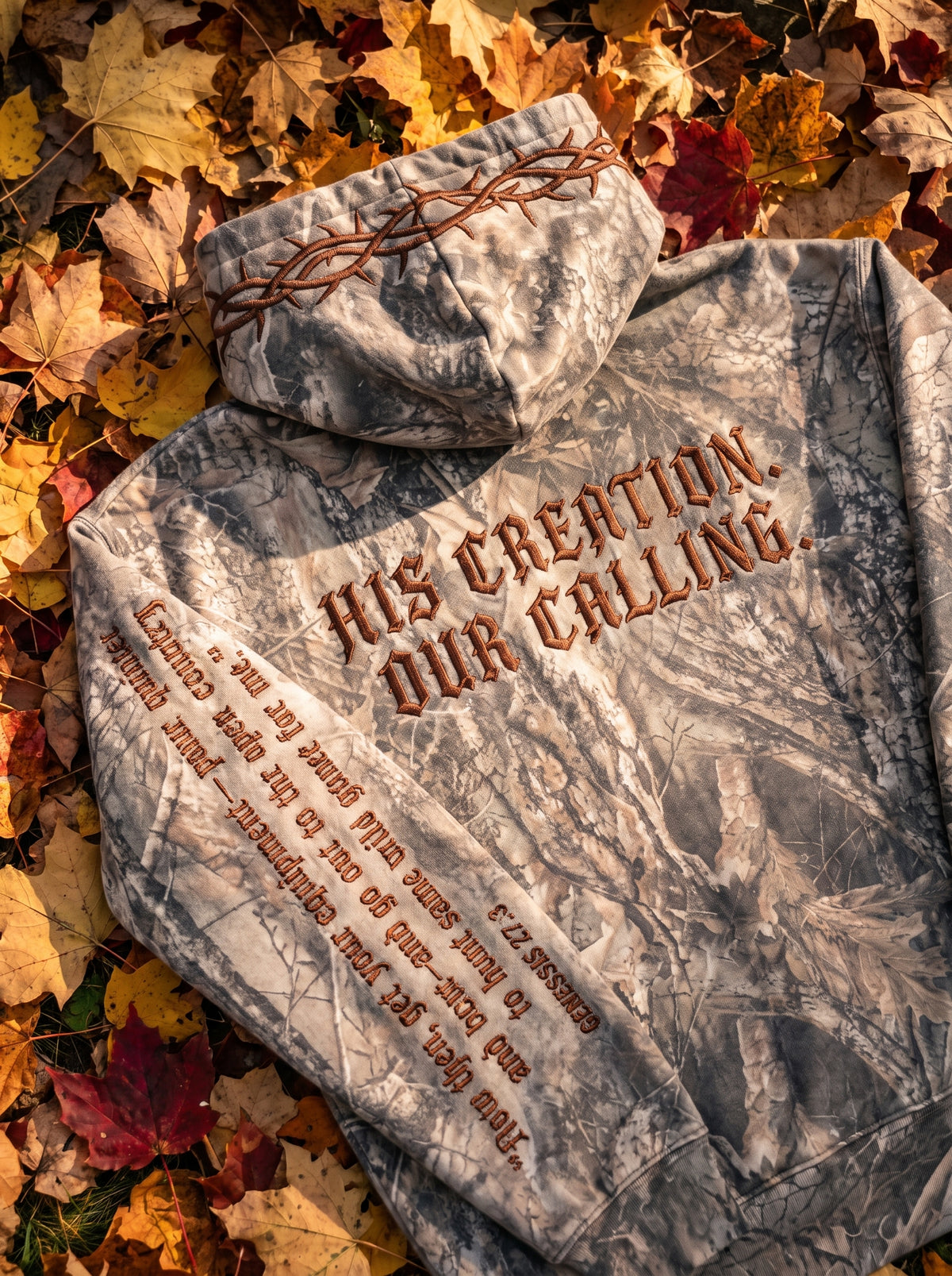 Back of the hoodie embroidered with His Creation. Our Calling.